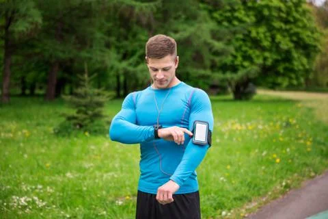 Man checking out the time Stock Photos