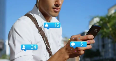 Man checking phone on street, chat bubble appearing, blue icons popping near Stock Footage 329117122