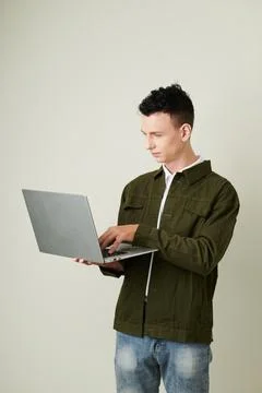 Man Checking Programming Code on Laptop Foto stock