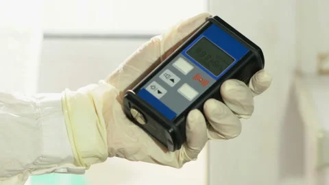 Man checking radiation with geiger counter Video stock 89134556