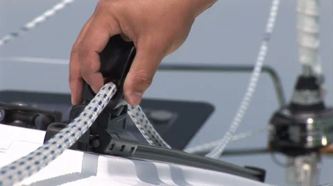 Man checking sail's rope Stock Footage 36176514