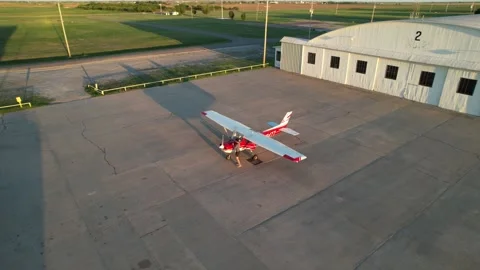 Man checking small plane before flight Stock Footage 240220795
