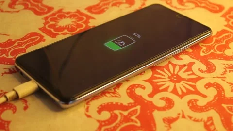 Man checking smartphone battery percentage Stock Footage 310219988
