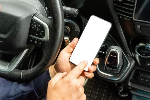 Man checking smartphone with white screen mockup Stock-Fotos