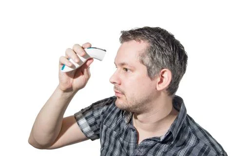 A man Checking temperature Stock Photos