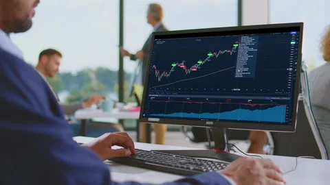 Man checking values in charts Stock Footage 164638621