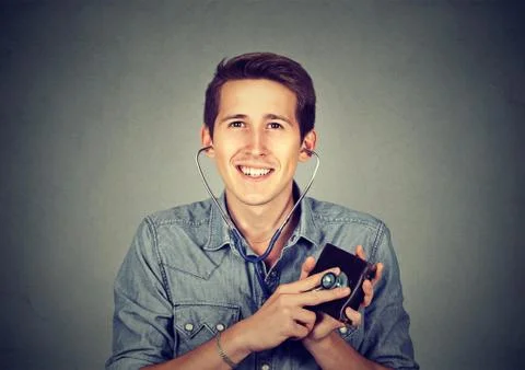 Man checking wallet with stethoscope. Concept of financial success. Stock Photos