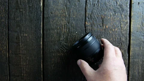 Man checks camera lens Stock Footage 106934834