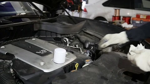 Man checks the engine oil Stock Footage 71193752