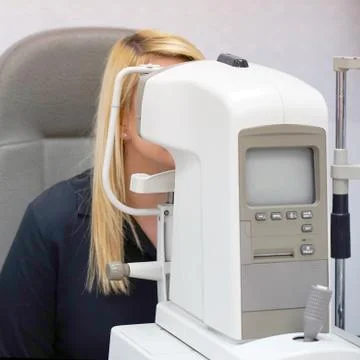 Man checks his vision on the machine Stock Photos