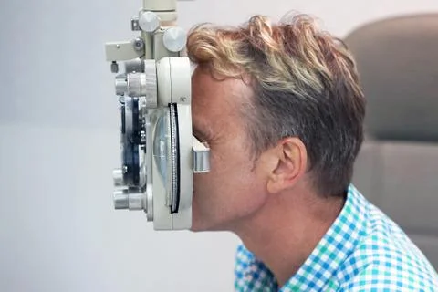 Man checks his vision on the machine Stock Photos