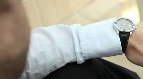 Man Checks Watch 库存影片 53253235