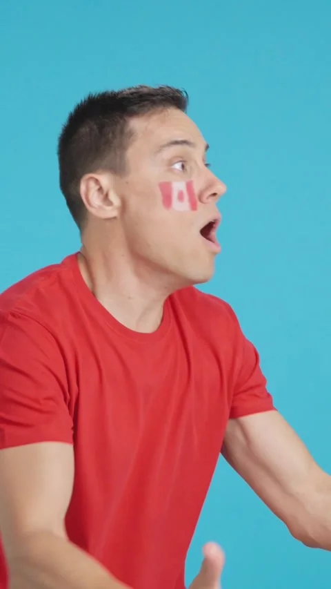 Man cheering for Canada, angry with the decision of referee Stock Footage 260835618