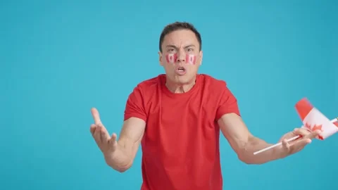 Man Cheering for Canada, angry with the decision of referee Stock Footage 262945284