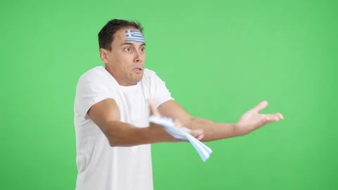 Man cheering for Greece, angry with the decision of referee Stock Footage 264999643