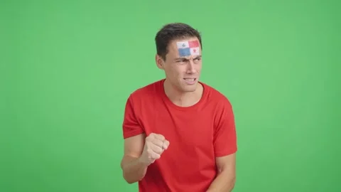 Man cheering for Panama during a match that is lost Stock Footage 274439309