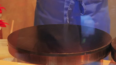 Man chef cooking pancakes Stock Footage 87504035