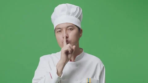 Man Chef Looking At Camera And Making Sh... | Stock Video | Pond5