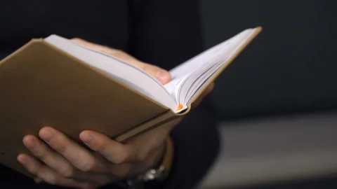 Man is cheking his planner Stock Footage 86394331