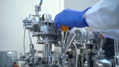 Man chemist is in work process with chemical fluid and equipment in Video stock 127796655