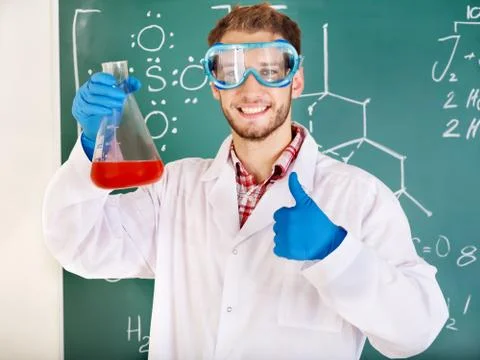Man chemistry student with flask. Stock-Fotos