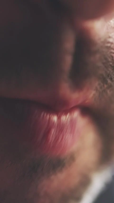 Man Chewing with Full Lips and Stubble Macro Shot Vertical Video Stock Footage 314925874