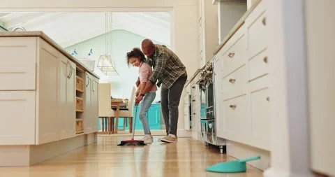 Man, child or broom in kitchen for cleaning, hygiene or good habit development Stock Footage 281087439