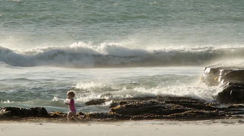 Man child play on the beach Stock Footage 58877694