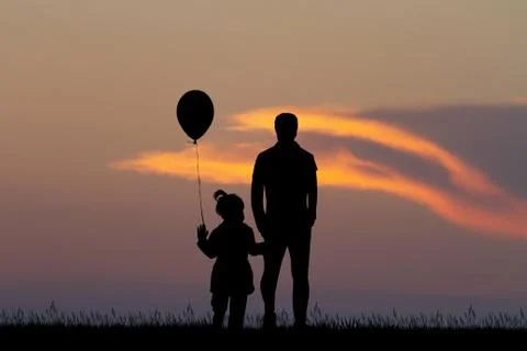 Man with child at sunset Stock Illustration