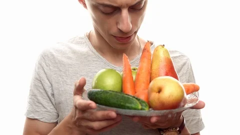 Man choose different vegetables and fruits Stock Footage 112768429
