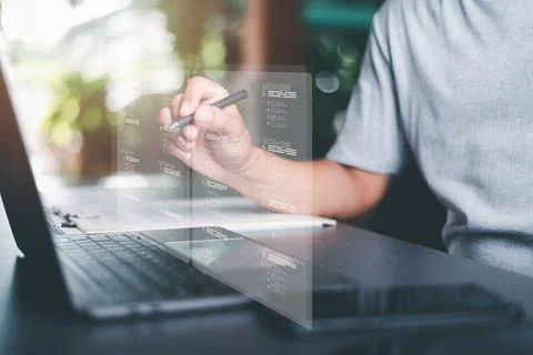 The man chooses the correct answer, marking online,online survey concept on.. Stock Photos