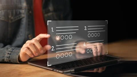 The man chooses the correct answer, marking online,online survey concept on.. 스톡 사진