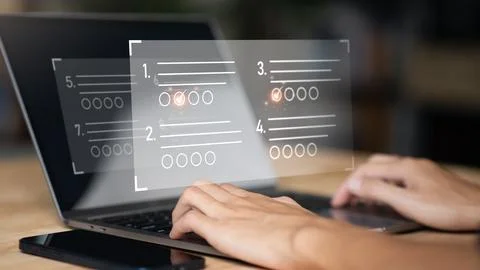 The man chooses the correct answer, marking online,online survey concept on.. Stock Photos
