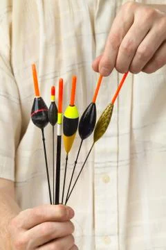 Man chooses the desired float from several floats Stock Photos