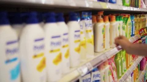 Man chooses products in the store Stock Footage 75569332