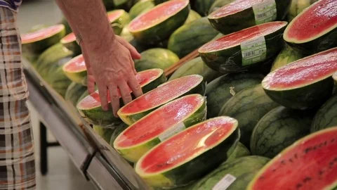 Man chooses products in the store Stock Footage 75569349