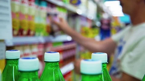 Man chooses products in the store Stock Footage 75569366