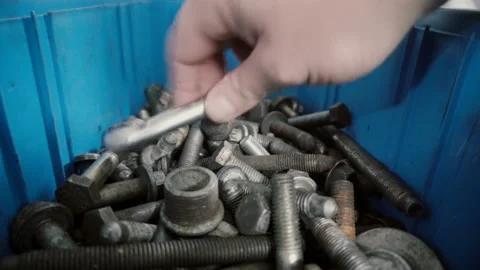 A man chooses in set of tools in open suitcase used for repair Stock Footage 86450950