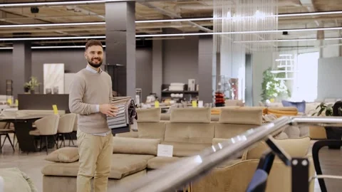 Man choosing fabric samples for home interior design Stock Footage 322550146