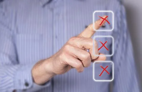 Man choosing wrong answer at digital screen with cross. Businessman taking ex Stock Photos