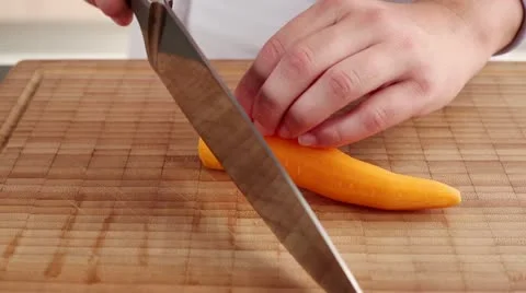 Man chopping carrots, close-up Stock-Footage 24672643