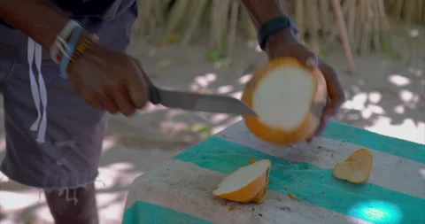 Man chopping fresh coconut close-up slow motion fresh coconut water pour Fresh Stock Footage 264044510