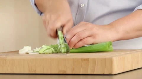 Man chopping leek, close-up Stock Footage 24672875