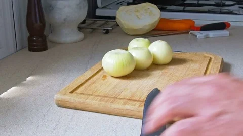 Man chopping vegetables Stock Footage 76586089