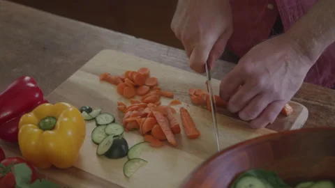 Man Chopping Veggies At Home Stock Footage 208794682