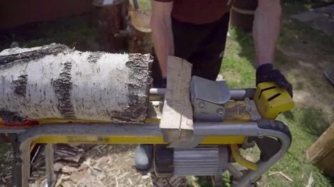 Man chopping wood with a special device Stock Footage 69206830