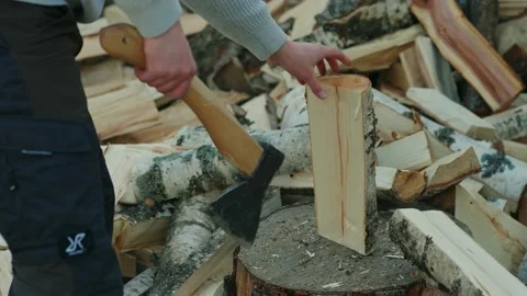 Man Chopping Wood Splitting A Log With An Axe Stock Footage 238525504
