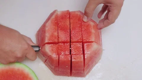 Man Chops Watermelon into Cubes with a Chefs Knife Stock Footage 79050094