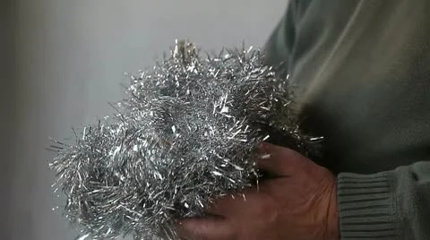 Man with Christmas tinsel Stock Footage 9769352