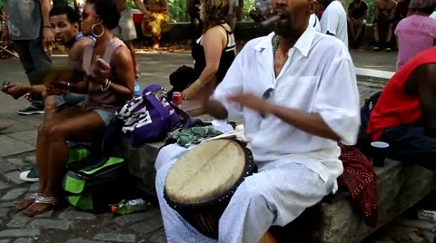 Man with cigar playing drums Stock Footage 54469744